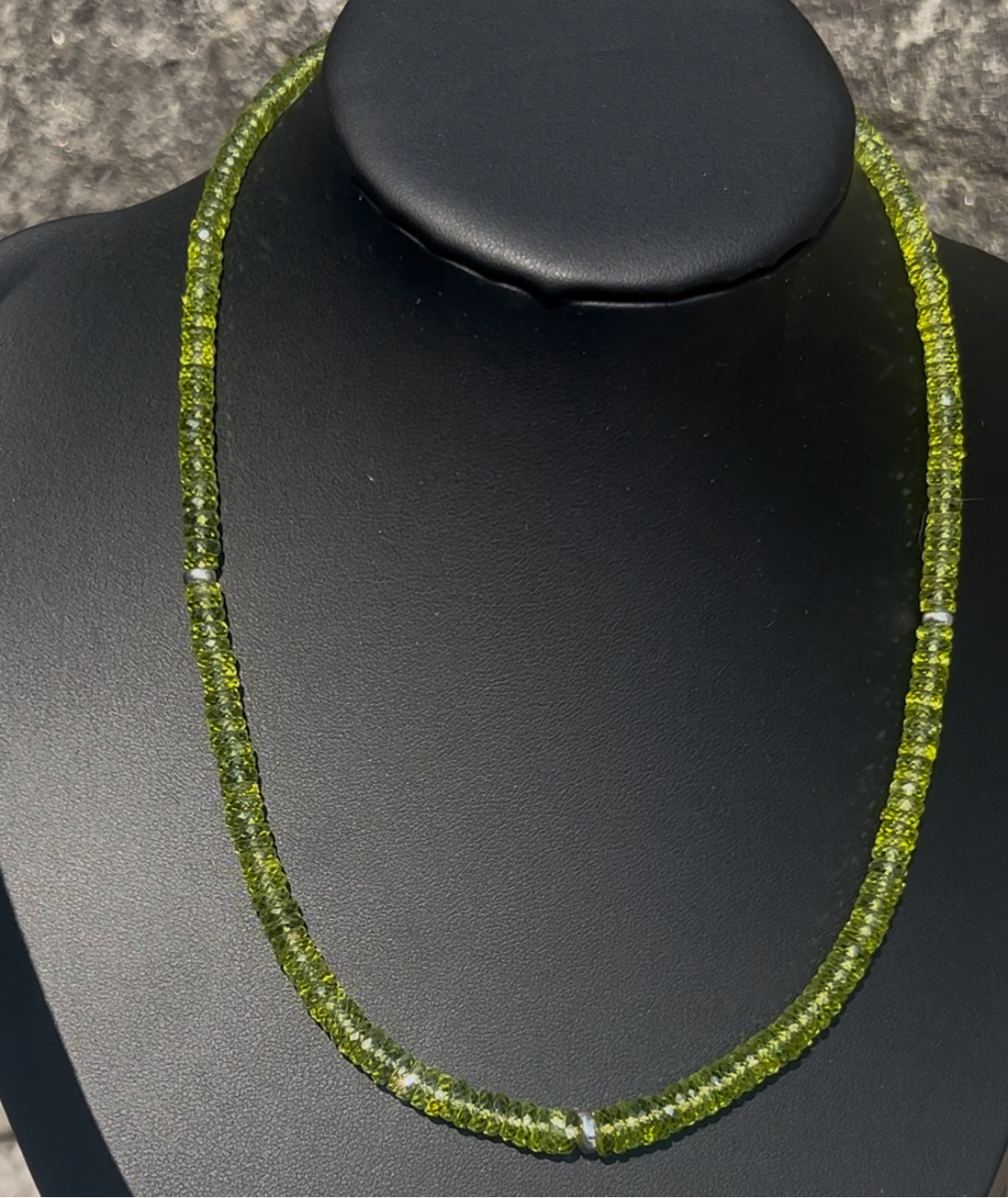 Handmade 110 ct natural peridot necklace with graduated faceted rondelle beads and three sterling silver 925 spacers, handcrafted by Giorgio for De Giorgi Gioielli.